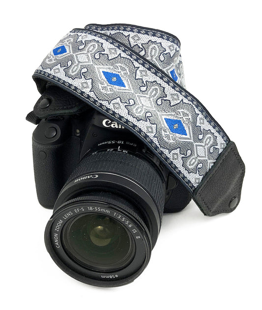 Silver / blue diamond jacquard camera strap.