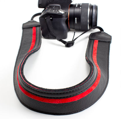 Black / red racing stripe leather camera strap.