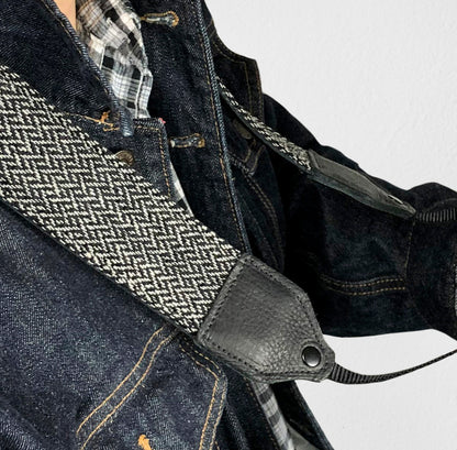 Gray tweed herringbone wool camera strap.