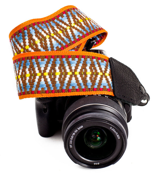 Orange / brown hootenanny nylon camera strap.