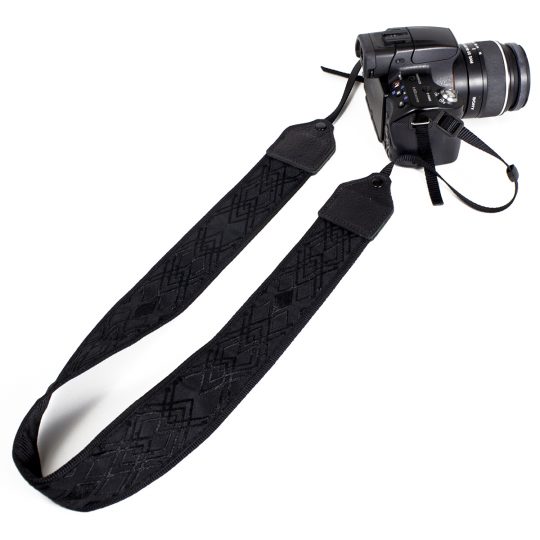 Black / black geometric jacquard camera strap.
