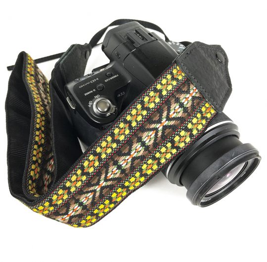 Yellow / brown hootenanny camera strap.