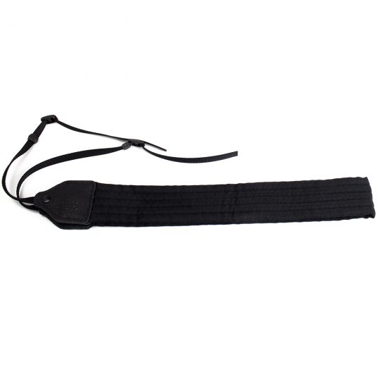 Black pleated nylon camera strap.