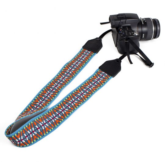 Turquoise / orange nylon geo camera strap.