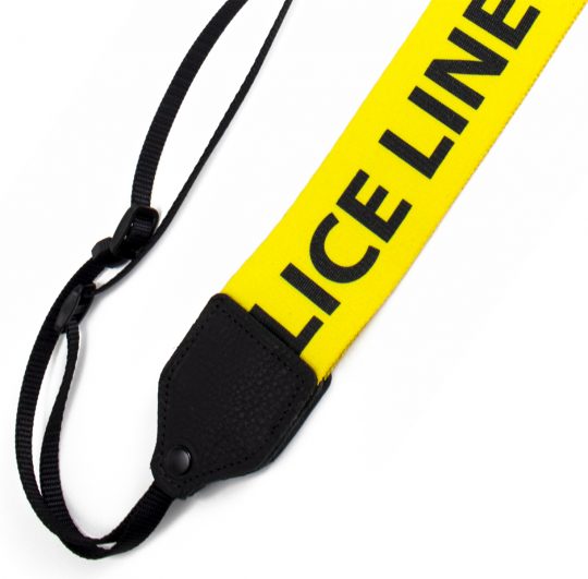 Police Line polyester camera strap.
