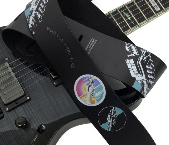 2.5” Official Licensing Pink Floyd Wish You Were Here Direct To Leather Printed Guitar Strap. Adjustable length of 52” to 59”